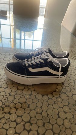 White and Black Vans