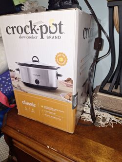 New crock pot 7 qt.. slow cooker