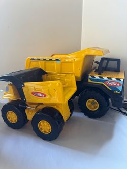 Tonka metal and plastic dump trucks set of 2