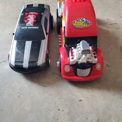 2 moving  Toy vehicles.