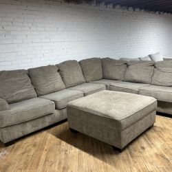Free delivery Ashley sectional couch and ottoman