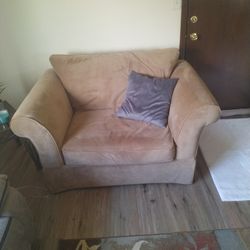 Tan Loveseat