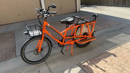 Orange Electric Cargo Bike with Rear Seat