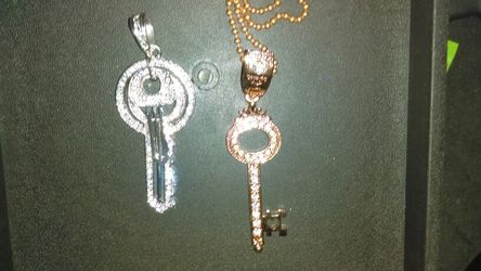2 different Key pendants. Only $30 each. Rose gold plated or Stainless Steel pendant.