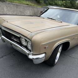 1966 Chevy Impala  $20,000
