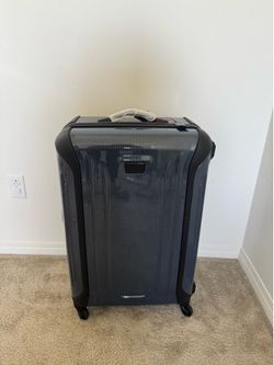 Blue Large 30 inch Tumi luggage