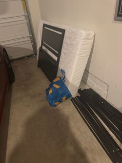 Twin size bed frame with mattress