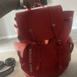 Louis VUITTON RED LEATHER CHRISTOPHER MM
