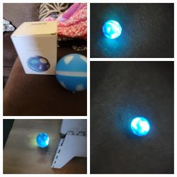 NEW USB CHARGED BALL FOR CATS OR DOGS. HAS MULTI COLORS AND SETTINGS