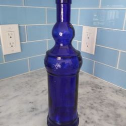 13" Tall Blue Glass Bottle decorative raised straps design