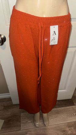 Women’s orange Flowy pants bling