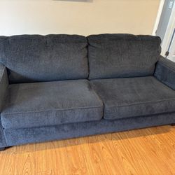 FIRM NAVY BLUE COUCH , 85 X 37  Good Condition