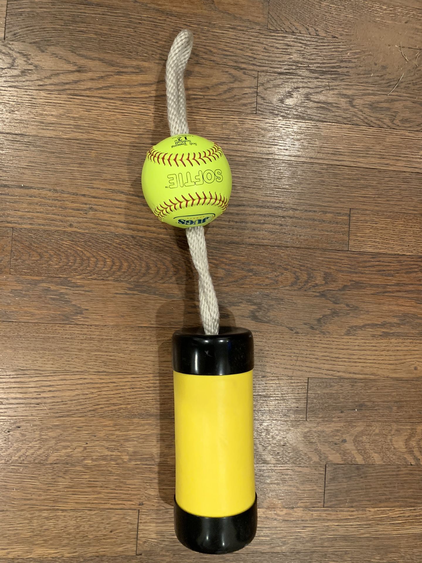 The Composite Xelerator Fastpitch Softball Pitching Trainer and Warm Up Tool with 12 Inch Premium Leather Indoor Ball for Improved Grip