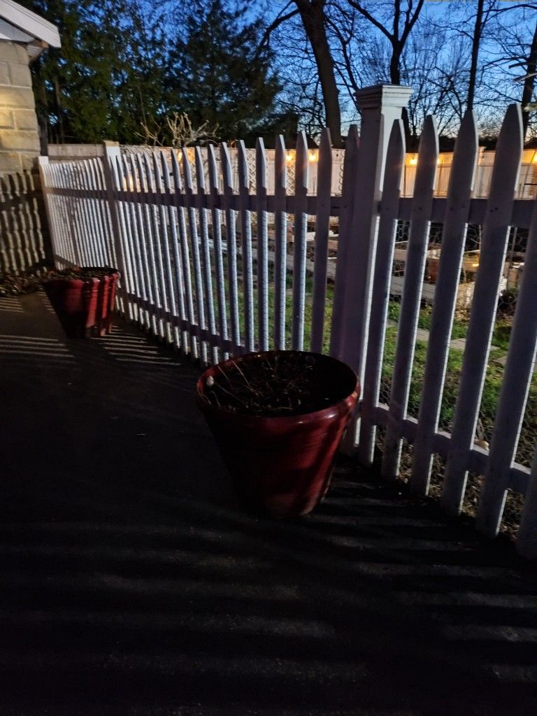 Two Large Red Plant Containers