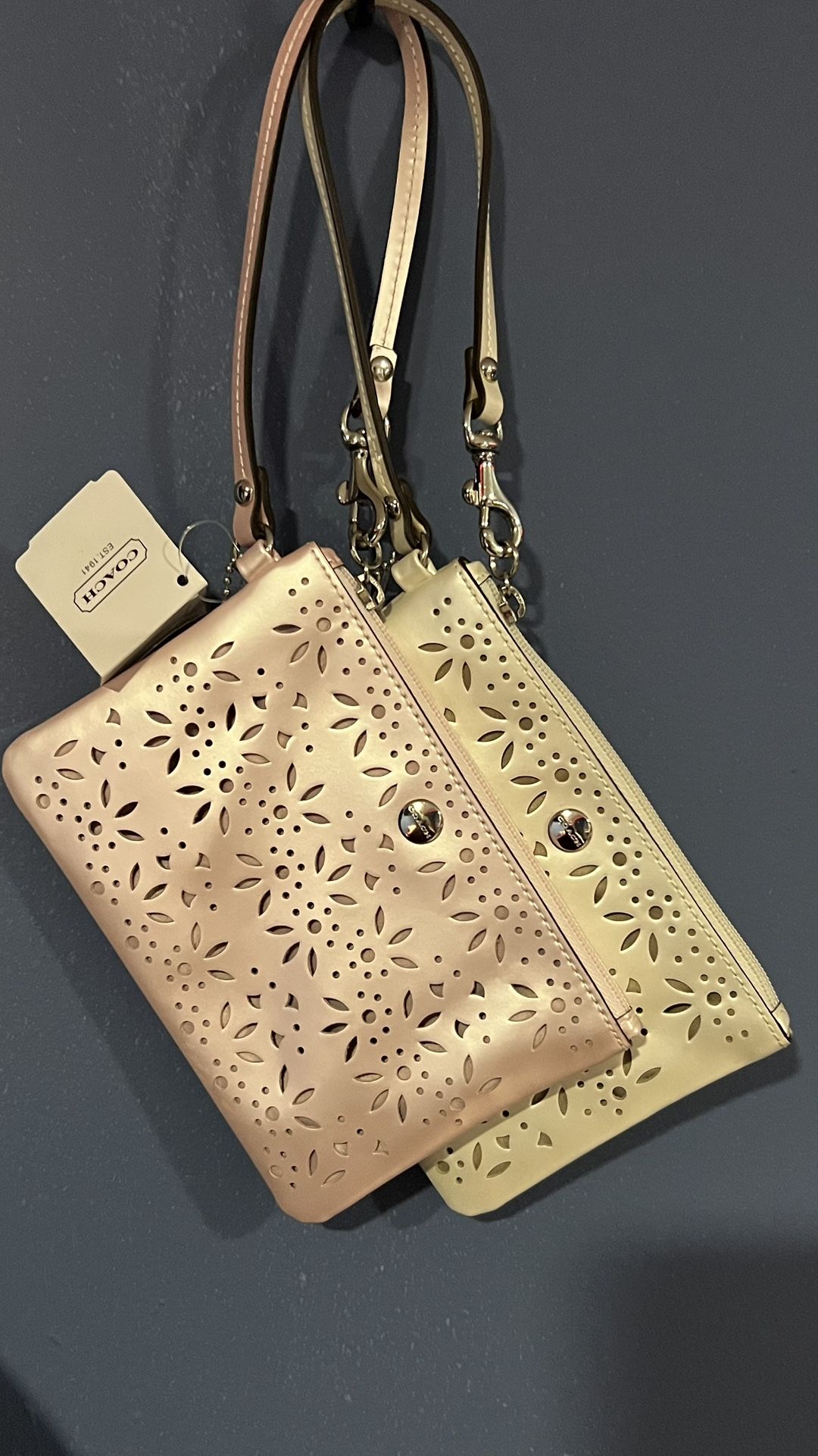 Coach floral wristlets