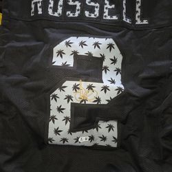 Authentic Autograph By Oakland Raiders football jersey featuring "RUSSELL" and the number 2.