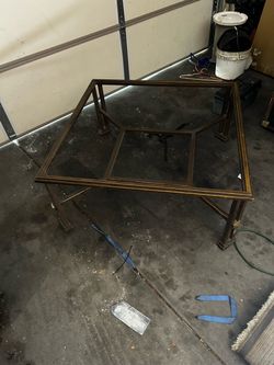 Iron and glass coffee table