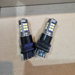 Bright Strobe 6000k white led light 3157 can be used for back up lights. 
Always Flashing type.