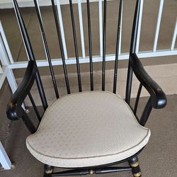 Antique ornate black rocking chair