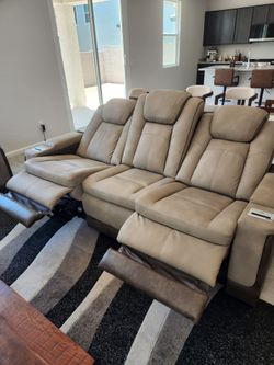 Ashley Furniture Brown/tan/neautral color leather electric zero gravity recliner three seat couch/sofa and loveseat set of 2 - with wireless charging,