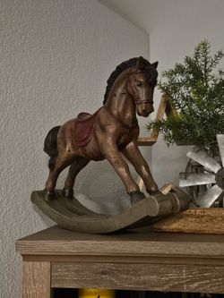 Wooden rocking horse.