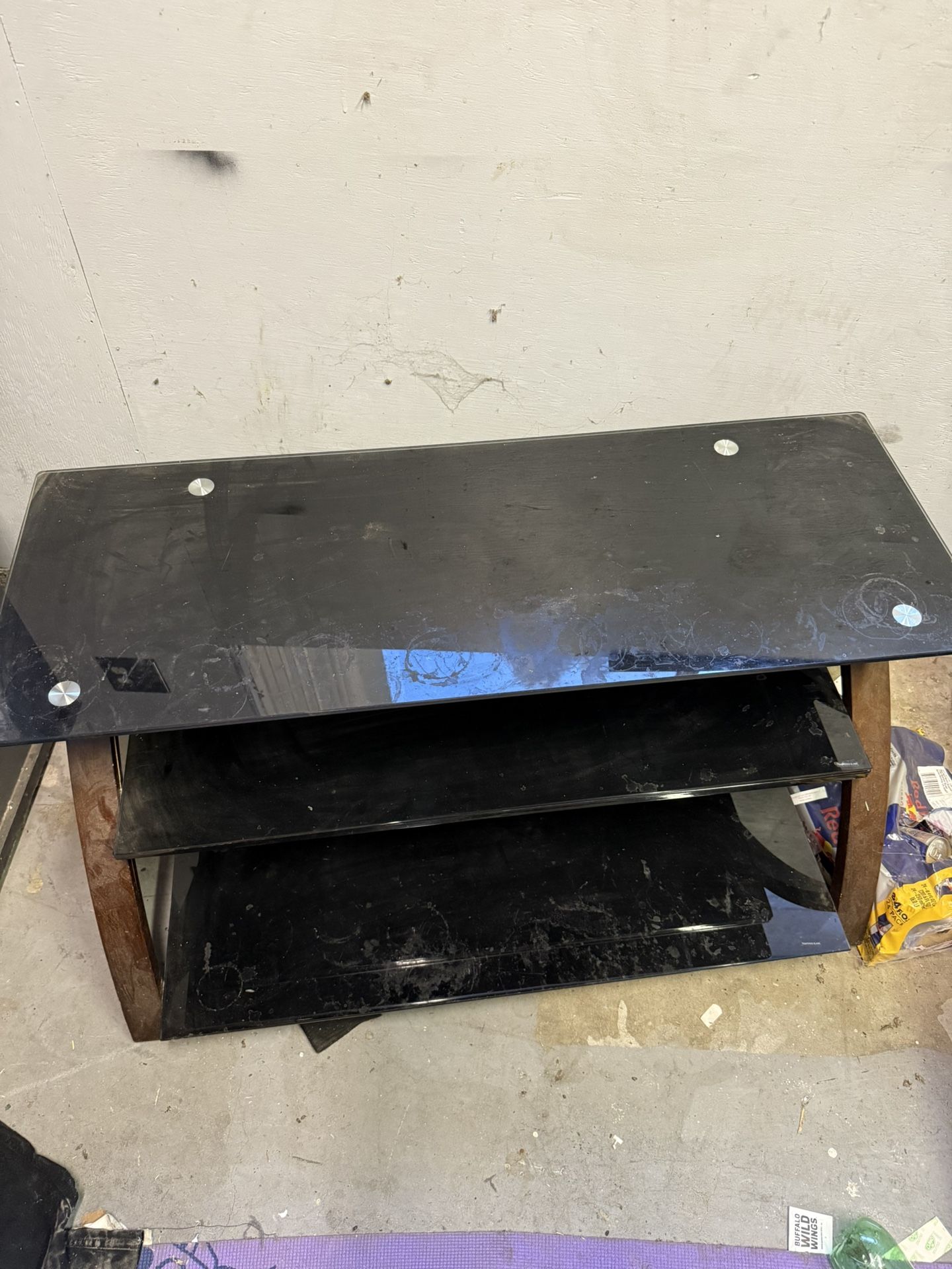 black glass TV stand / entertainment unit