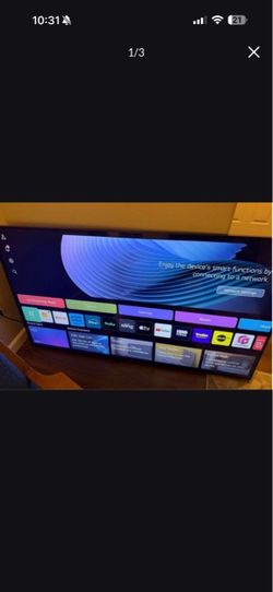LG TV in great condition 65” with remote control and wall frame