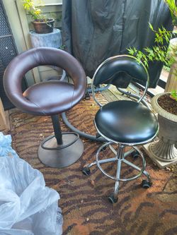 Two bar stools /desk chairs /art chairs