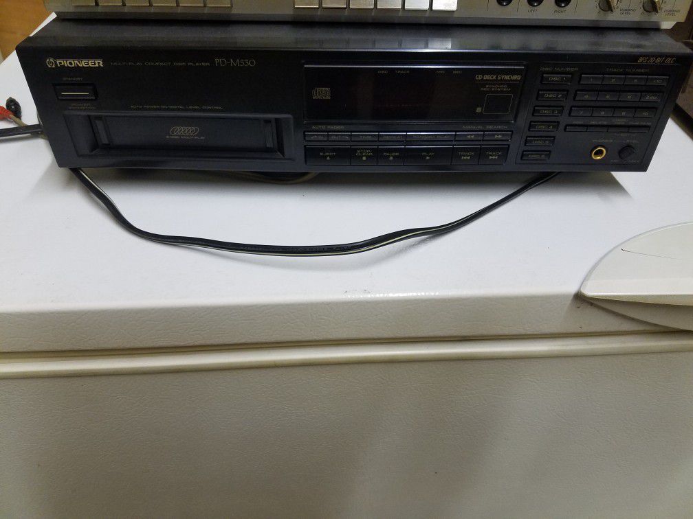 Pioneer PD-M530 compact disc player with book and extra cartridges