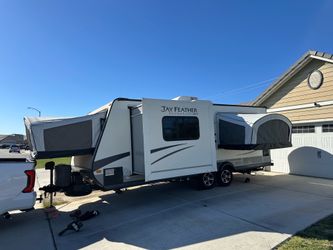 2015 Jayco RV feather ultralight.  Model X 23F  Hybrid camping, trailer