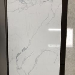 Delicatto Carrara Polished Quartz Slab • 27.75” x 116” • Bedrosians Stone