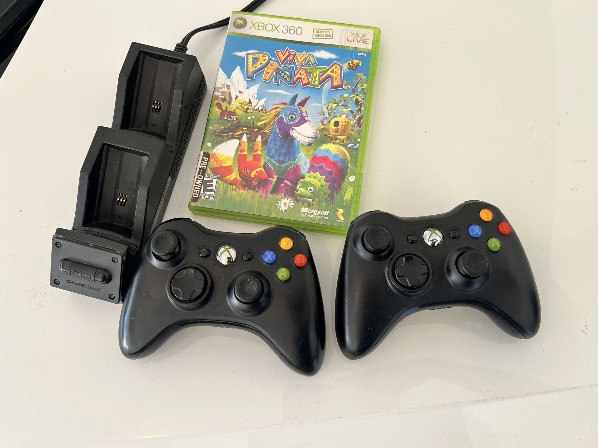 Microsoft Xbox 2 Black Wireless Controller + free Nyko Charging Base + Free Game