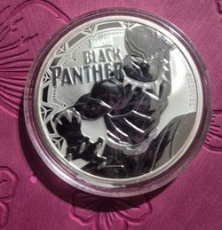 Silver coin with Black Panther