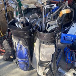 Golf Clubs With Bags And Other Stuff 