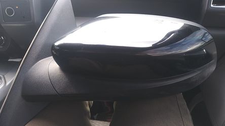 Mirror for a 2014 Ford Taurus SHO