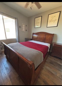 Queen size sleigh bed with two matching side tables - was a guest room set.