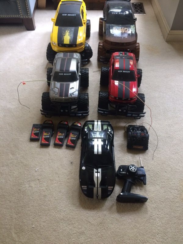 Lot of 5 RC monster trucks and car