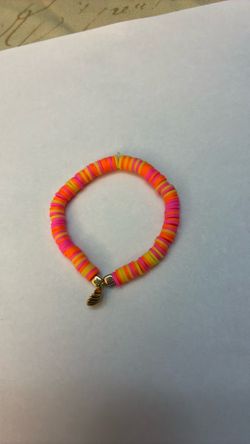 Summer Pink Yellow and Orange colored bracelet with a shell Charm