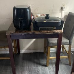 Air fryer and a hot plate