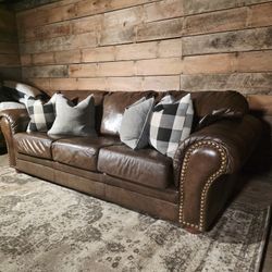 Leather Center Brown Nailhead Rolled-Arm Sofa
  