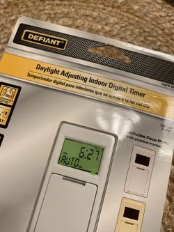 Daylight adjusting indoor timer
