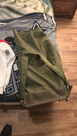 60 year old Navy issues military duffle backpack
