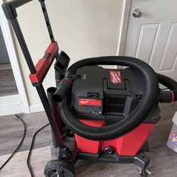 Brand New Milwaukee Dual battery M18 vacuum with premium cart