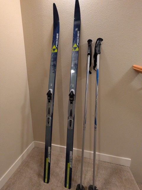 Child / kid Cross Country skis by Fischer Austria. BC Cross Country Crown with Rossignol binders and 48" Axium made in Italy aluminum poles.