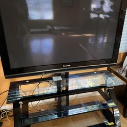 50 “ Television With Stand And Glass Shelves