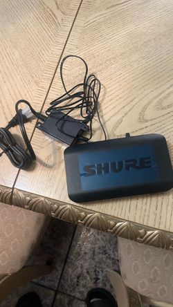 Shure BLX4 Single-Channel Wireless Receiver. The specific H11 variant operates within the 572 to 596 MHz UHF analog frequency range.