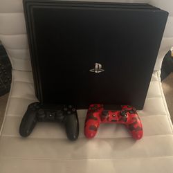 PlayStation 4 Pro With 8 Games Games and 2 Controllers