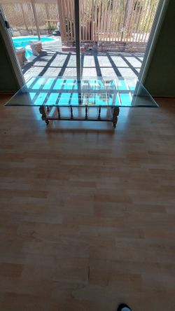 Glass Top Coffee Table With Hand Built Base On Rollers