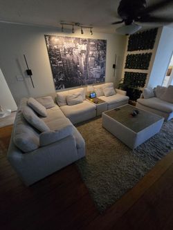 Couches, center table, console unit with wireless charging