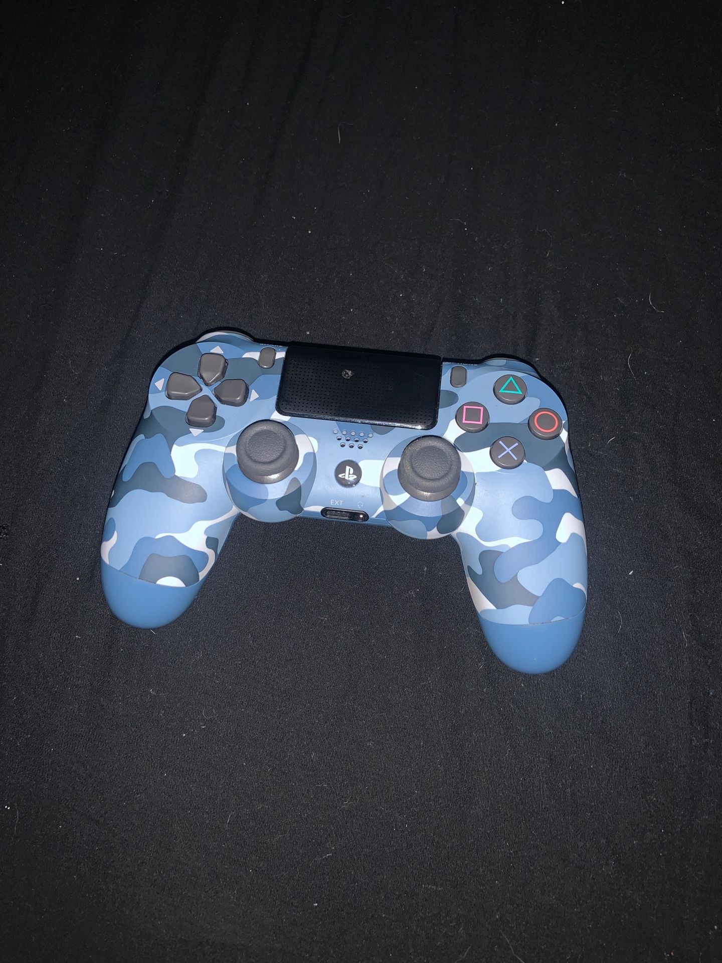 PlayStation 4 controller and game